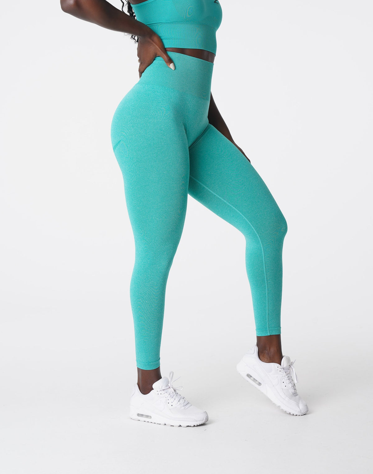 Women Turquoise Curve Seamless Leggings | NVGTN