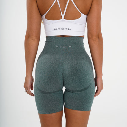 Women Forest Green Biker Shorts | NVGTN