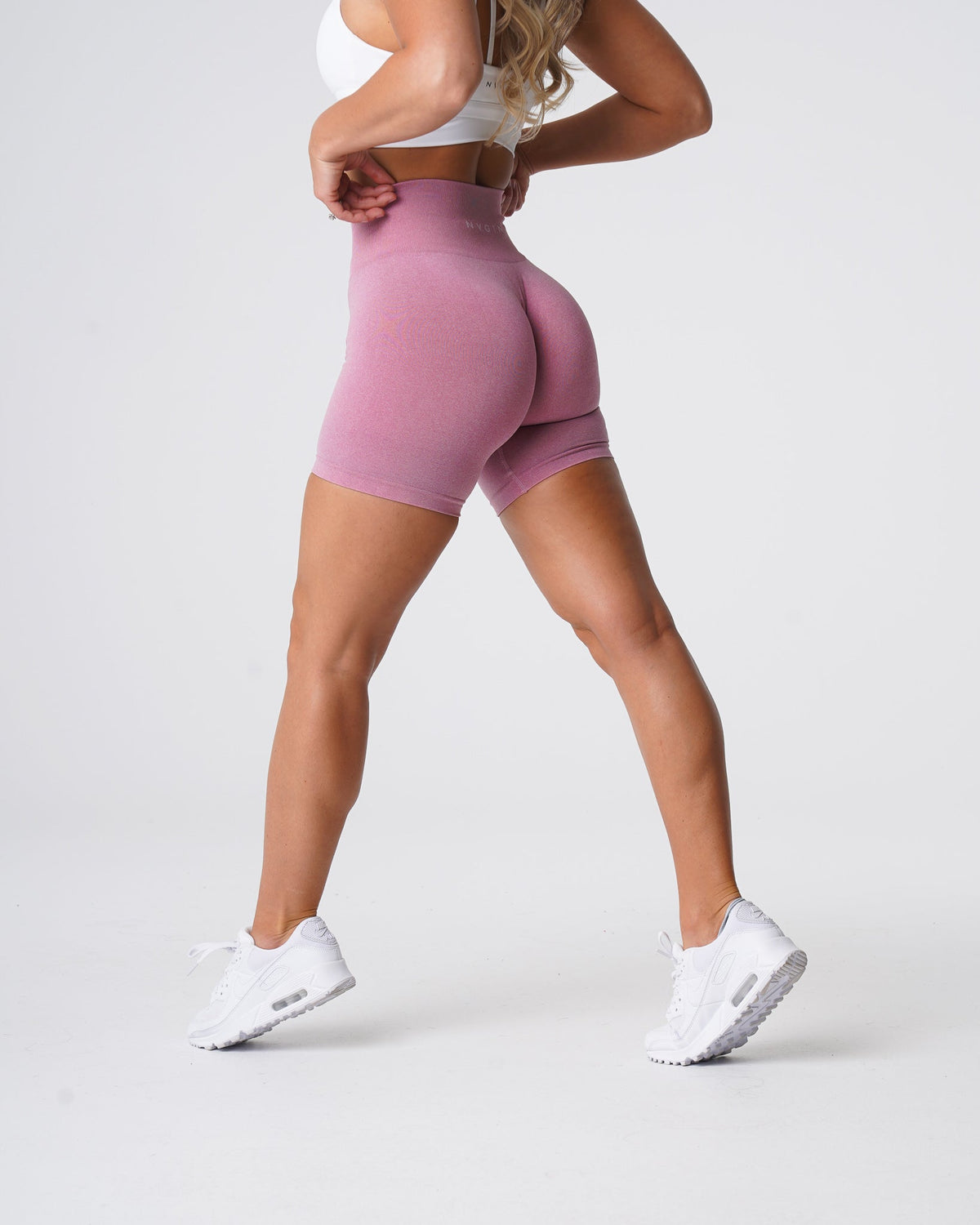 Women Pastel Pink Pro Seamless Shorts | NVGTN