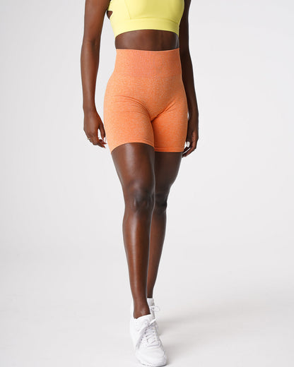 Women Sunset Orange Scrunch Seamless Shorts | NVGTN