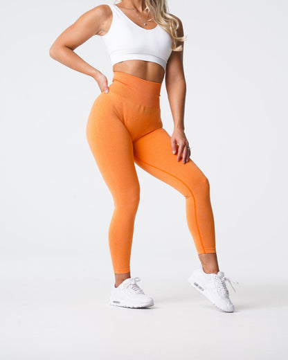 Women Sunset Orange NV Seamless Leggings | NVGTN