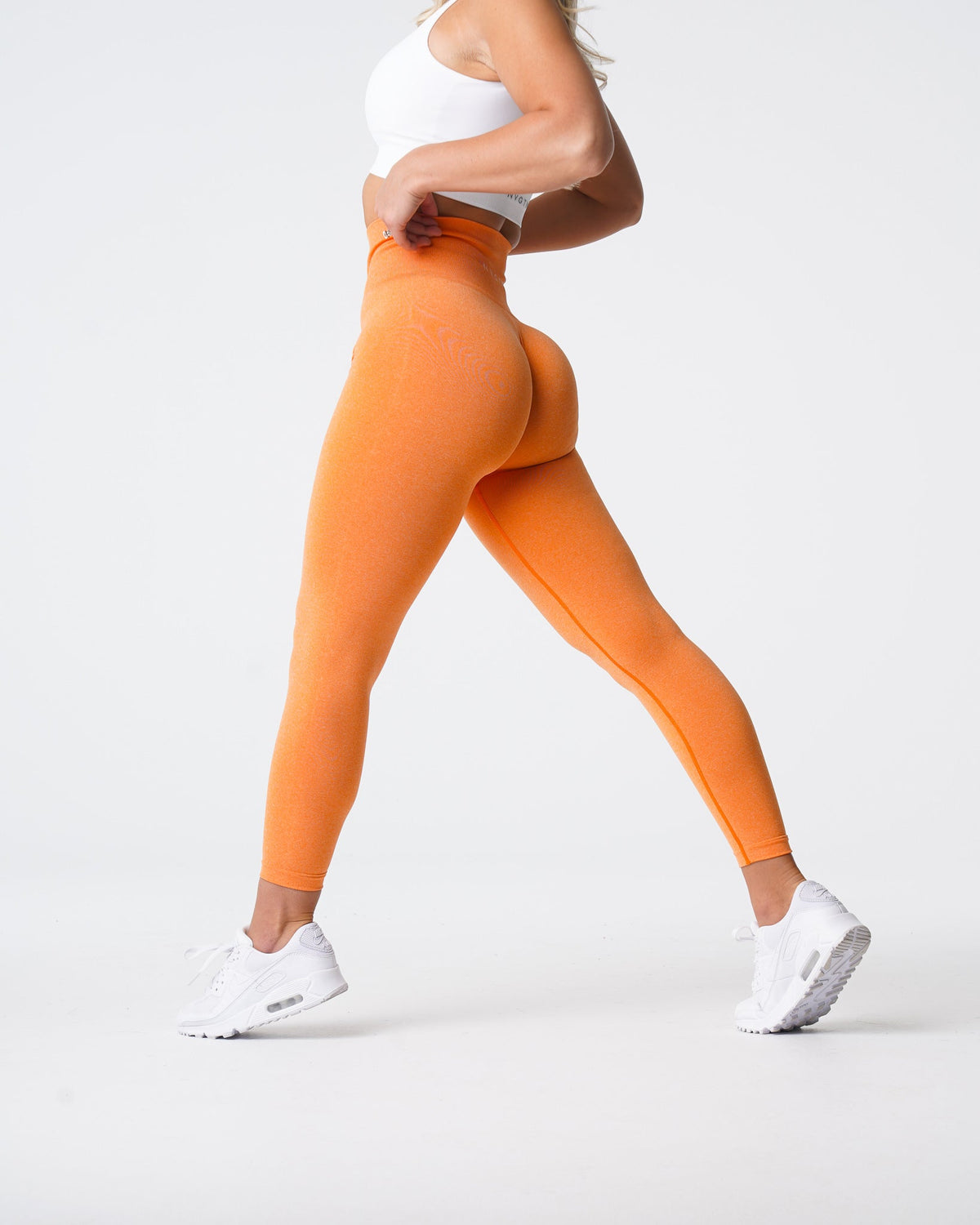 Women Sunset Orange NV Seamless Leggings | NVGTN