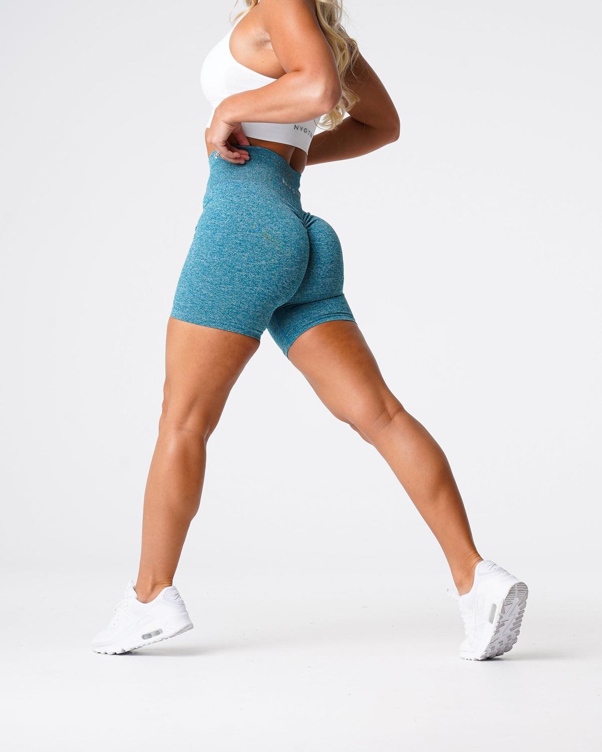 Women Teal Scrunch Seamless Shorts | NVGTN