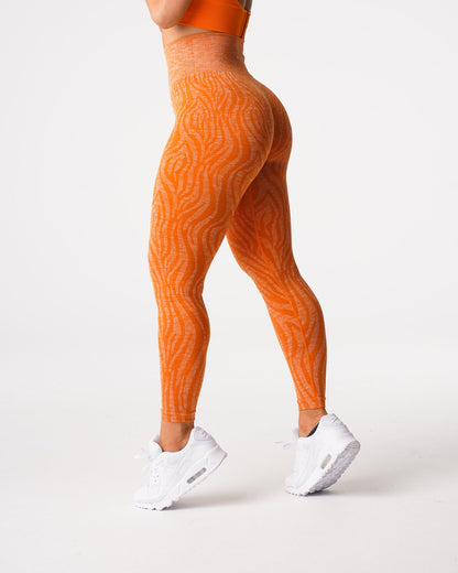 Women Burnt Orange Zebra Seamless Leggings | NVGTN