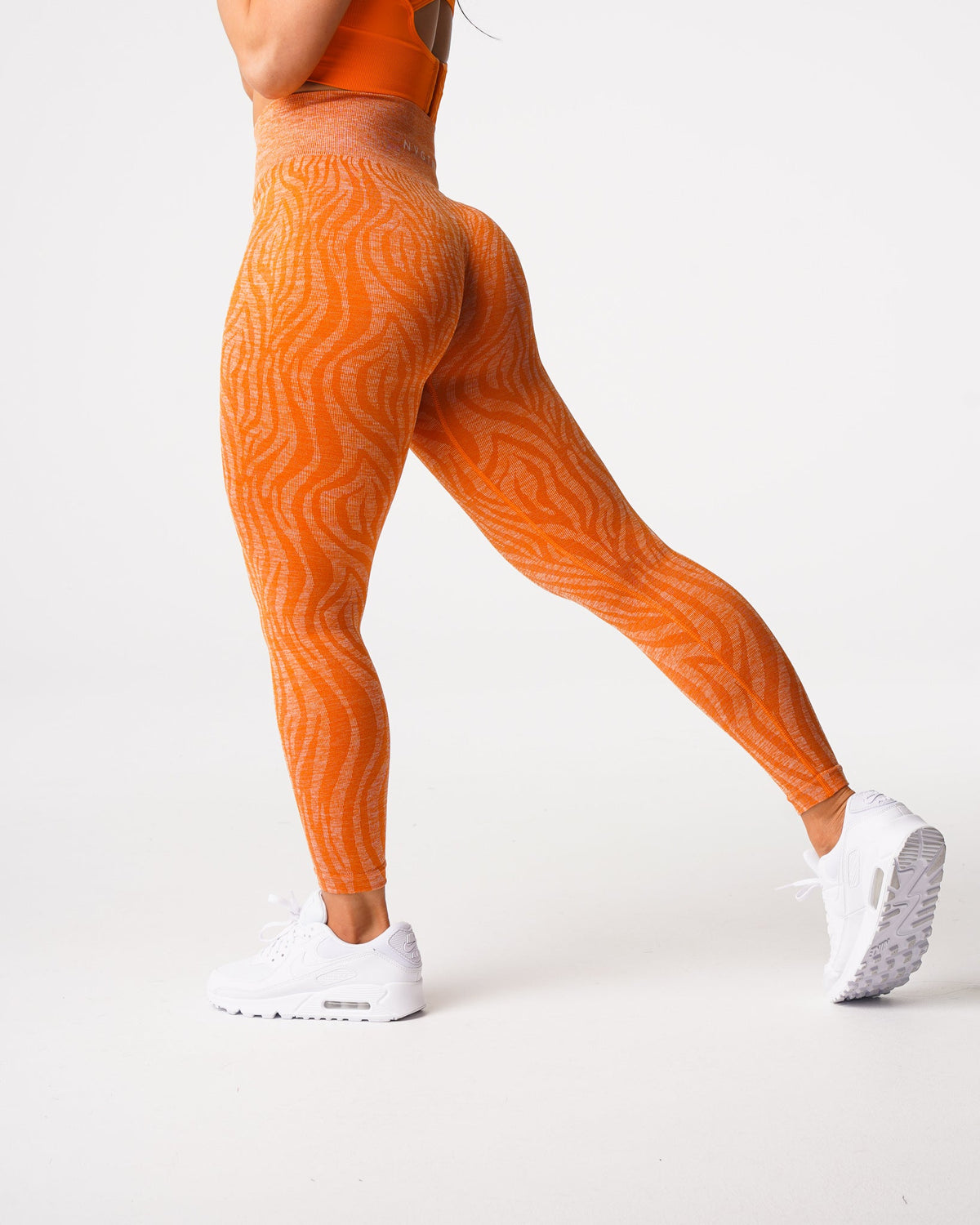 Women Burnt Orange Zebra Seamless Leggings | NVGTN