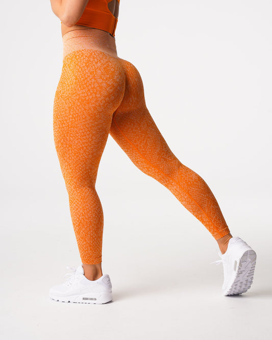 Women Burnt Orange Snakeskin Seamless Leggings | NVGTN