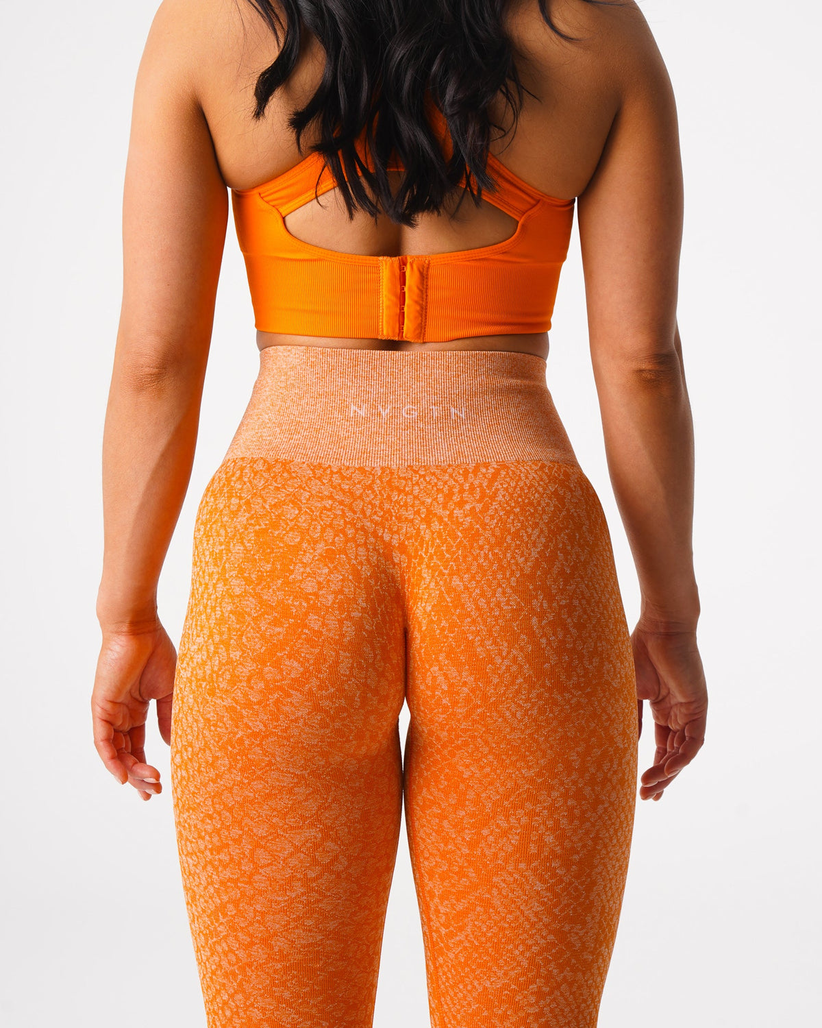 Women Burnt Orange Snakeskin Seamless Leggings | NVGTN