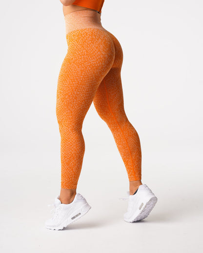 Women Burnt Orange Snakeskin Seamless Leggings | NVGTN