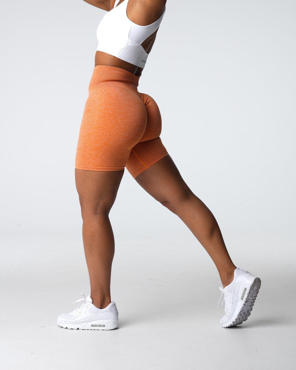 Women Burnt Orange Scrunch Seamless Shorts | NVGTN