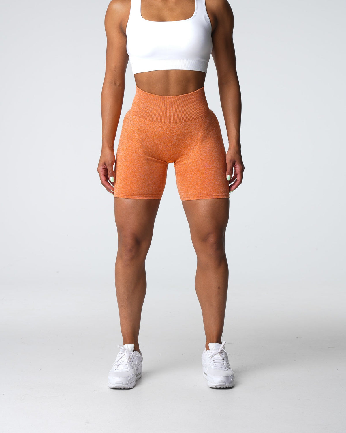 Women Burnt Orange Scrunch Seamless Shorts | NVGTN
