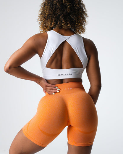 Women Sunset Orange Contour Seamless Shorts | NVGTN