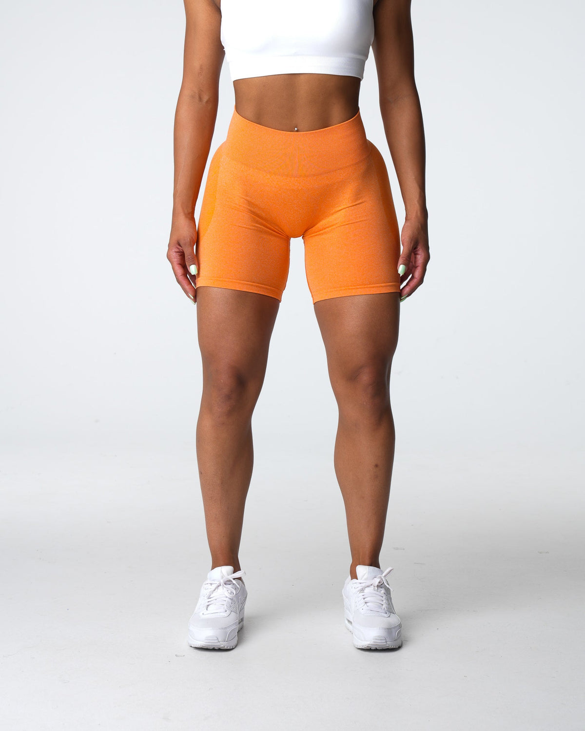 Women Sunset Orange Contour Seamless Shorts | NVGTN