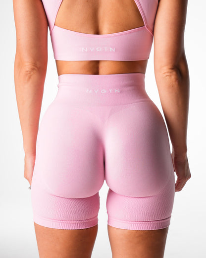 Women Baby Pink Lift Seamless Shorts | NVGTN