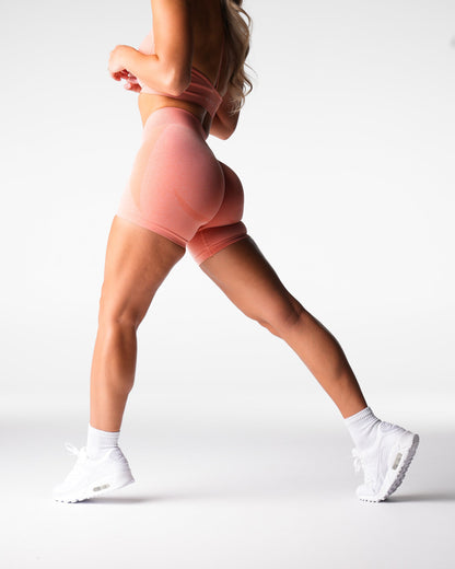 Women Peach Mid Rise Contour Seamless Shorts | NVGTN