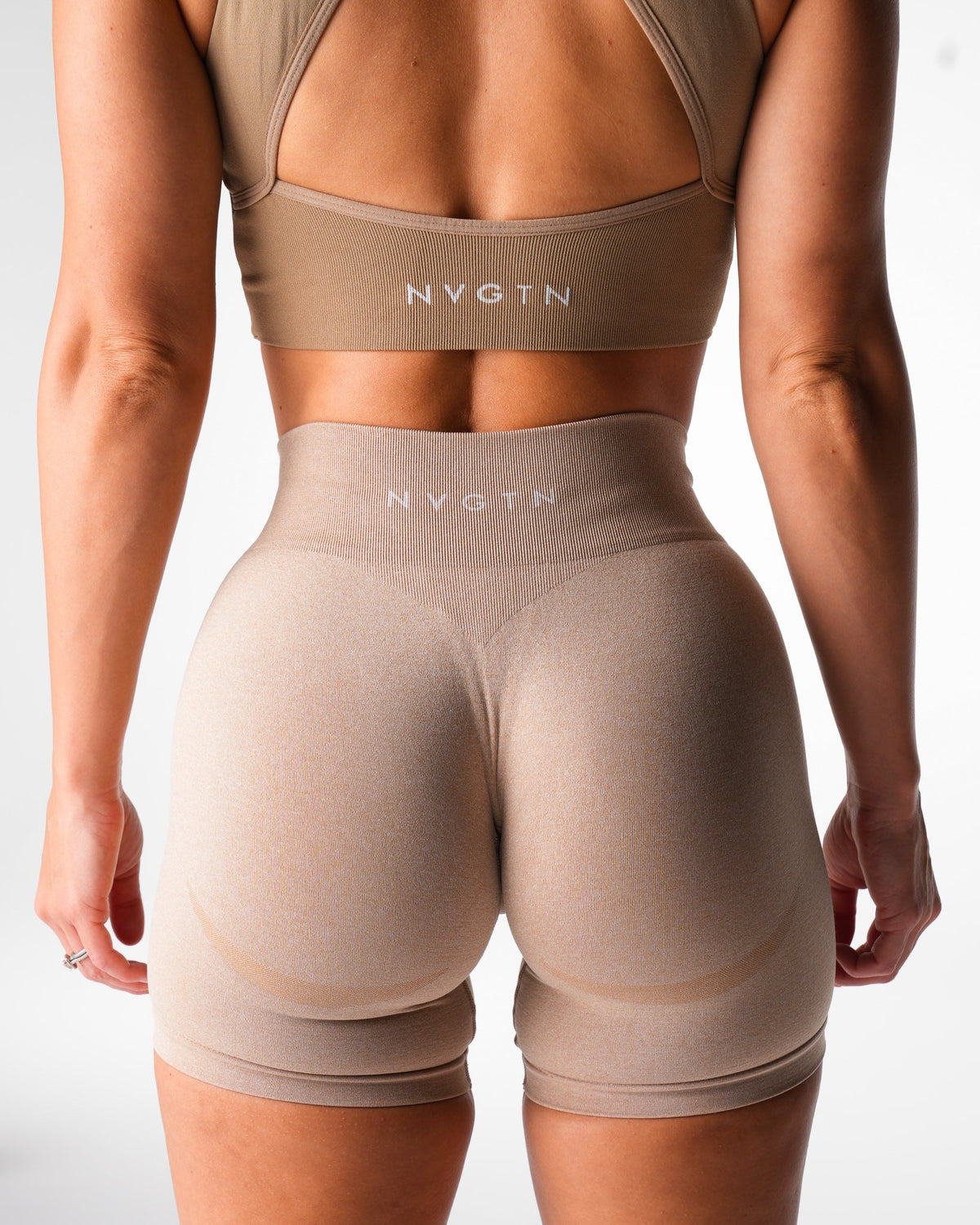 Women Beige Mid Rise Contour Seamless Shorts | NVGTN