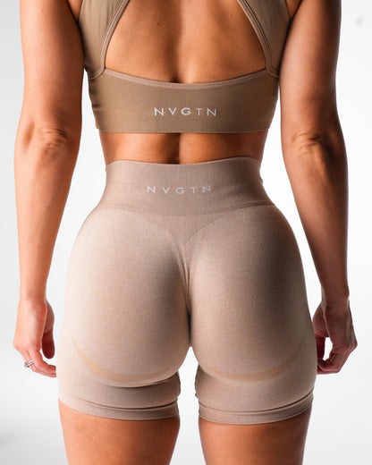 Women Beige Mid Rise Contour Seamless Shorts | NVGTN