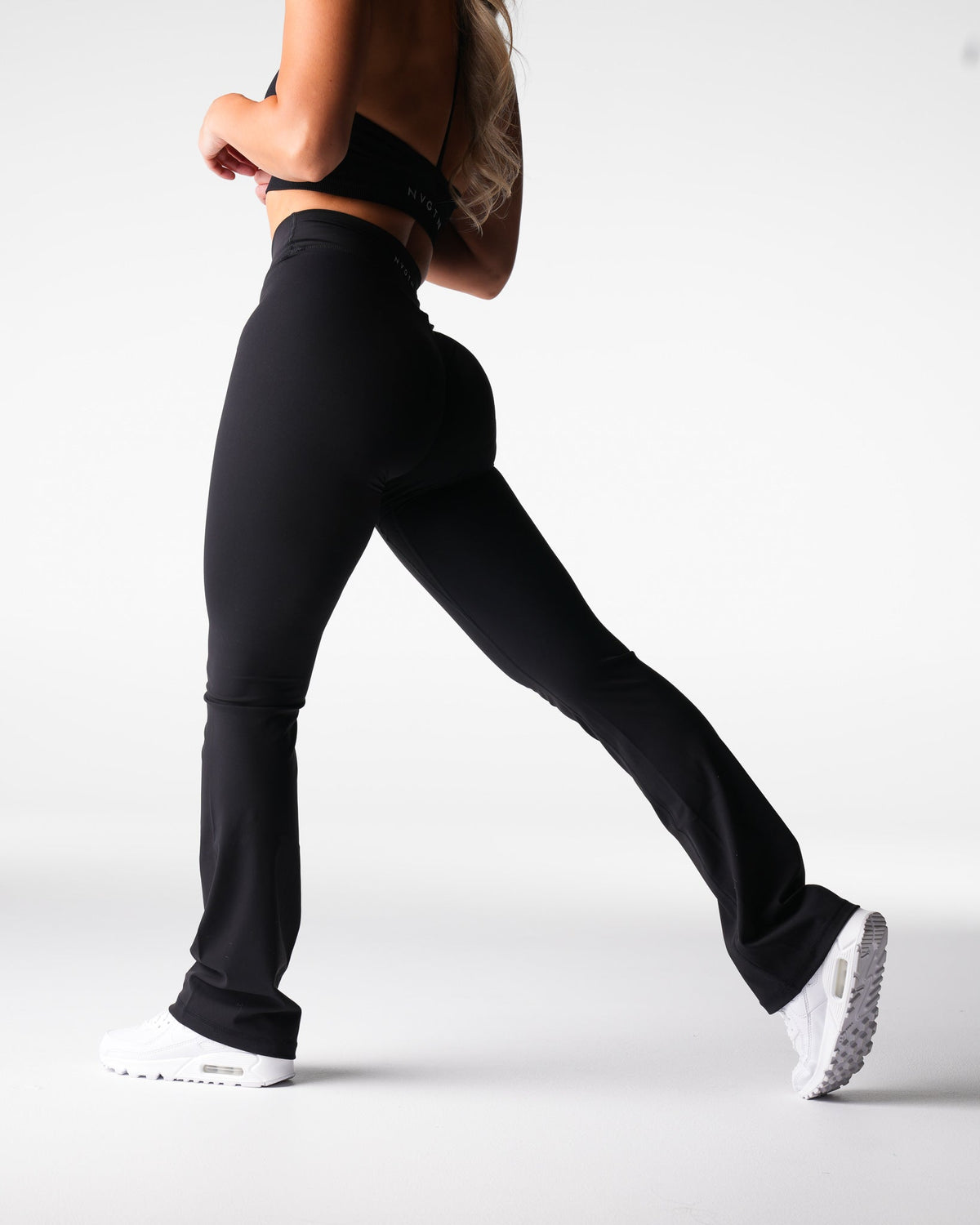 Women Black Effortless Flare Leggings | NVGTN
