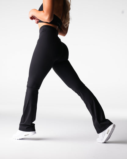 Women Black Effortless Flare Leggings | NVGTN