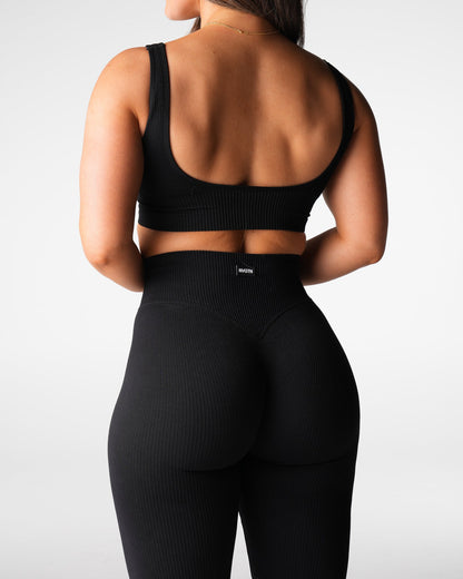 Women Black Harmony Ribbed Seamless Flare Leggings | NVGTN