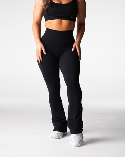 Women Black Harmony Ribbed Seamless Flare Leggings | NVGTN
