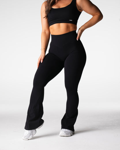 Women Black Harmony Ribbed Seamless Flare Leggings | NVGTN
